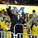 The Michigan Marching Band Alumni director pumps up the crowd during a break in the action in the first half against Iowa at Crisler Center on Sunday, Jan. 6. Michigan beat Iowa 95-67 in the Big Ten home opener. Melanie Maxwell I AnnArbor.com